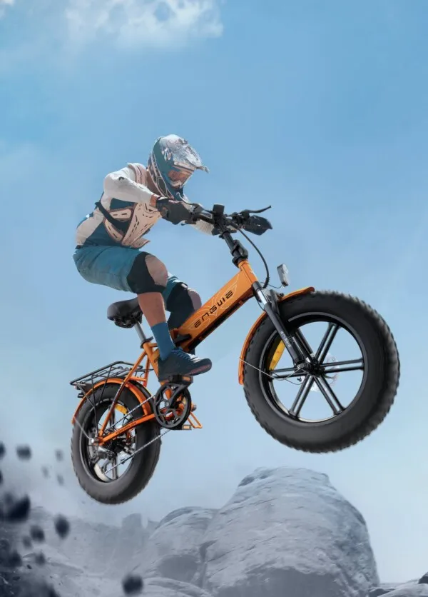 Man Riding The E-Bike In Mountains